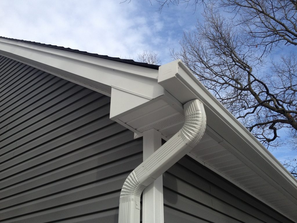 installed gutters on a house